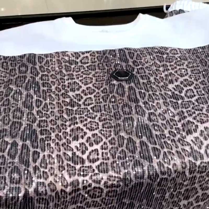 Conjunto de dos piezas de moda para mujer con estampado de leopardo y ajuste cómodo y holgado